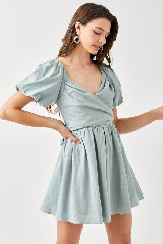 CARLINE CROSS WRAP SMOCKED BACK DRESS