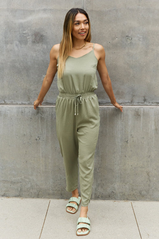 Showstopper Textured Woven Jumpsuit in Sage